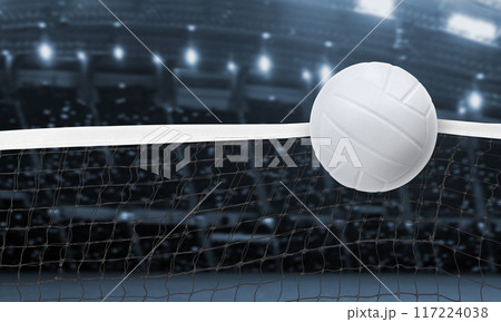 Volleyball caught on the edge of the net There is a stadium background. 117224038