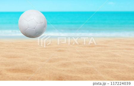 Beach landscape with soccer ball, summer season and water and blue sky background. 117224039