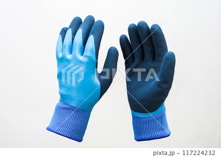 Warm winter rubberized gloves with fur, white background 117224232