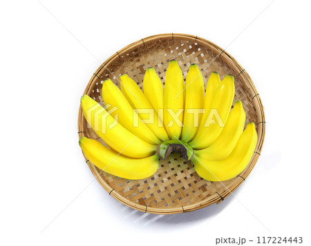 bananas in woven basket isolated on white background 117224443