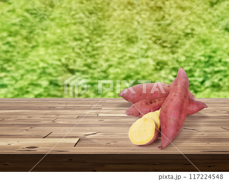 sweet potato on wooden table There is a garden field in the background. sweet potato on wooden table There is a garden field in the background. 117224548