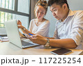 Young business team discuss about information on laptop 117225254