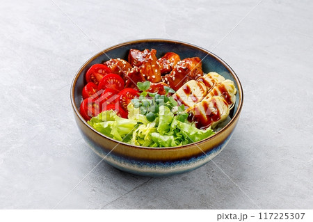 Poke bowl with teriyaki chicken and Japanese omelet Poke bowl with teriyaki chicken and Japanese omelet 117225307