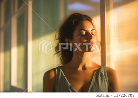 Tranquil Spa Moments: A Woman's Bliss in Golden Hour Glow 117226705
