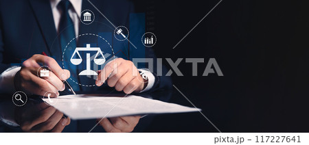 Lawyer with law related icons, copy space Lawyer with law related icons, copy space 117227641