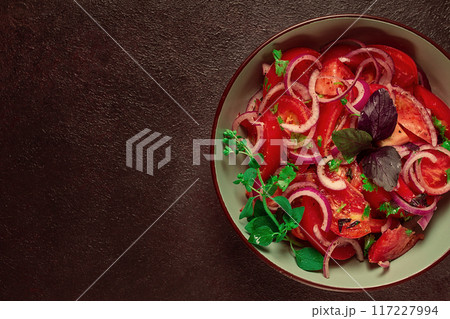 fresh tomato salad, with red onion, spices and herbs, top view, close-up, homemade, 117227994