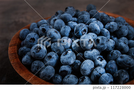 fresh blueberries, in a wooden bowl, on the table, top view, close-up, no people, fresh blueberries, in a wooden bowl, on the table, top view, close-up, no people, 117228000