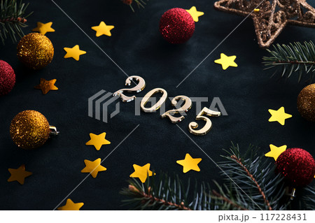 New Year 2025 background. Number of the coming year in Christmas decoration. New Year 2025 background. Number of the coming year in Christmas decoration. 117228431