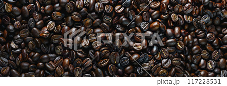 A seamless background made entirely of roasted coffee beans, providing a rich, textured look 117228531