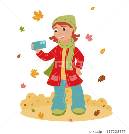 A happy girl with a phone in her hands takes a selfie. The autumn season. Vector illustration in the flat style on a white background. A happy girl with a phone in her hands takes a selfie. The autumn season. Vector illustration in the flat style on a white background. 117228575
