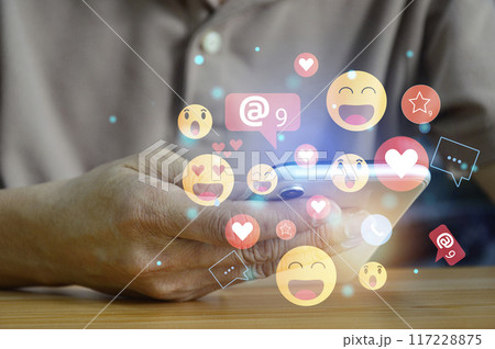 Use of social media and digital smartphones Holiday lifestyle and social media concept online marketing Connecting technology networks in global business 117228875