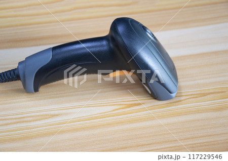 barcode scanner Placed on wooden floor 117229546