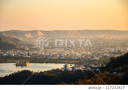 View of Man Sagar Lake, Jal Mahal, and the Jaipur City from the 17th century Jaigarh Fort at Jaipur, Rajasthan, India View of Man Sagar Lake, Jal Mahal, and the Jaipur City from the 17th century Jaigarh Fort at Jaipur, Rajasthan, India 117232627
