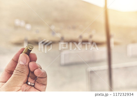 The power of a life in your fingers, holding a 9mm bullet. 117232934