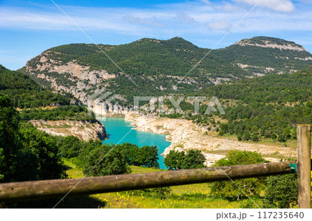Bright summer day on shore of La Llosa de Coval reservoir, in Llobregat River valley, Cardener river 117235640