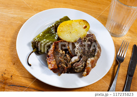 Fried fatty and juicy lamb and vegetable side dish of potato and bell pepper 117235823
