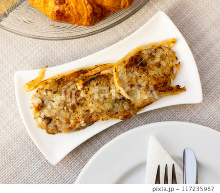 Traditional spanish girella lamb sausage on plate 117235987