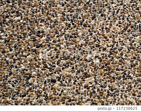 A pile of concrete tiles filled with rocks on top A pile of concrete tiles filled with rocks on top 117236625