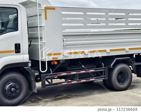 Truck are parked beside each other in a parking area Truck are parked beside each other in a parking area 117236688