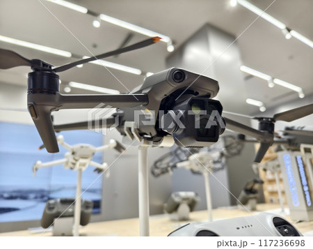 Modern drone for video and photo in the light store 117236698