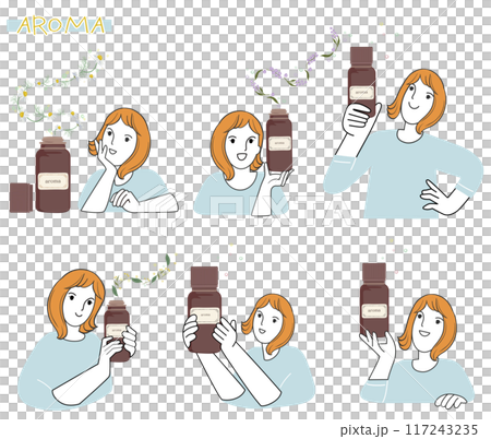 手に精油を持ってアロマの香りを楽しむ女性 117243235