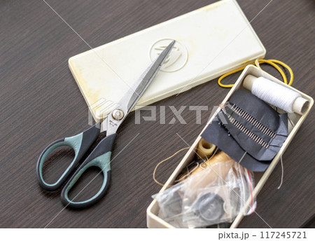 Close up shot of the box with sewing supplies 117245721