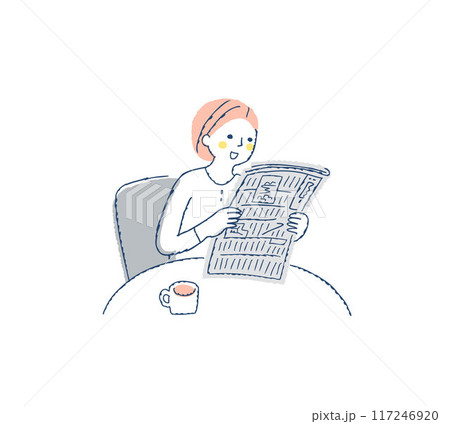 テーブルに座って新聞を読んでいる笑顔の女性 117246920