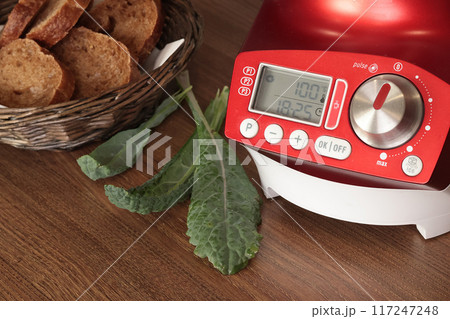 Electric soup maker for making pureed vegetable soup. Useful cream soup and healthy eating. Cooking at home in kitchen. Home smart equipment. Electric soup maker for making pureed vegetable soup. Useful cream soup and healthy eating. Cooking at home in kitchen. Home smart equipment. 117247248