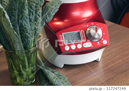 Electric soup maker for making pureed vegetable soup. Useful cream soup and healthy eating. Cooking at home in kitchen. Home smart equipment. Electric soup maker for making pureed vegetable soup. Useful cream soup and healthy eating. Cooking at home in kitchen. Home smart equipment. 117247249