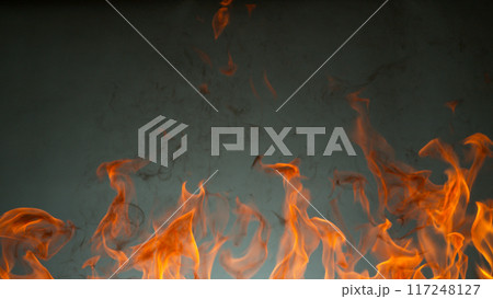 Fire flames isolated on dark grey , abstract background Fire flames isolated on dark grey , abstract background 117248127