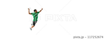 Dynamic image of focused, skillful badminton player, main min motion hitting shuttlecock in jump isolated on white background Dynamic image of focused, skillful badminton player, main min motion hitting shuttlecock in jump isolated on white background 117252674