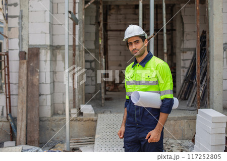 portrait of man engineer builder house construction wear white helmet and safety uniform. 117252805