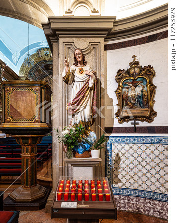 The golden interior of the Carmelite church Igreja do Carmo at Faro in Portugal 117253929