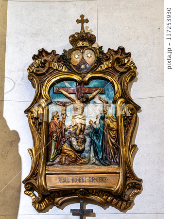 The golden interior of the Carmelite church Igreja do Carmo at Faro in Portugal 117253930