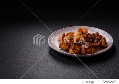 Delicious crispy baked chicken wings in teriyaki sauce Delicious crispy baked chicken wings in teriyaki sauce 117255227