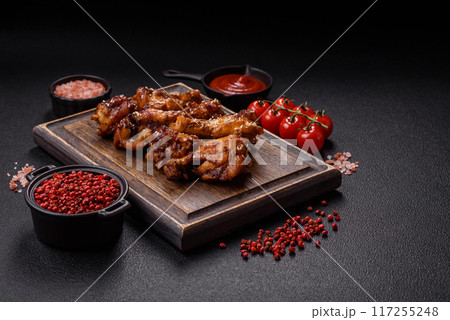 Delicious crispy baked chicken wings in teriyaki sauce Delicious crispy baked chicken wings in teriyaki sauce 117255248