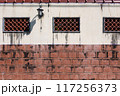 Chinese red brick walls with lattice windows 117256373