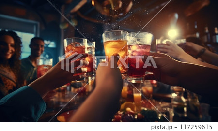 Friends hands clinking glasses with cocktails on bright background for joyful celebration. Summer vibe 117259615
