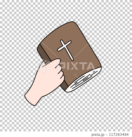 A hand holding a brown book with a cross on it A hand holding a brown book with a cross on it 117263484