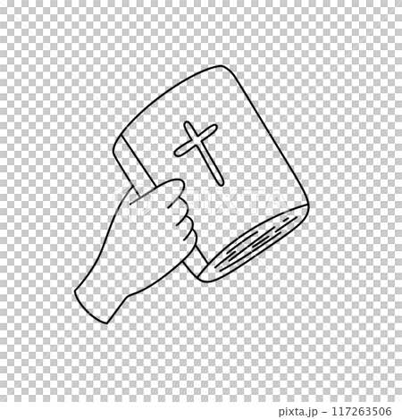 A hand holding a book with a cross on it 117263506