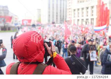 A photographer photographs a festive procession in Moscow, May 9, 2022, an immortal regiment. 117264264