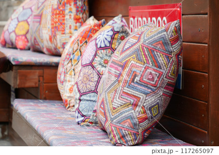 Colourful cushions on display for sale in a traditional Turkish Bazaar. 117265097