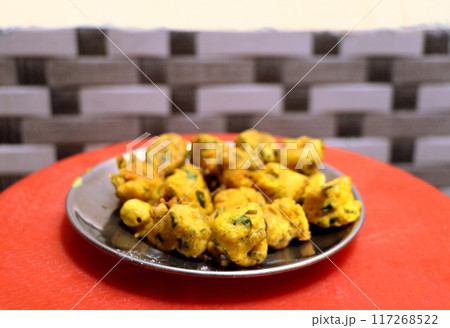 Popular street food item mix bhajiya snacks or Pakoda or Pakora 117268522