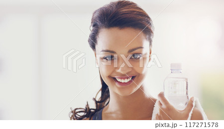 I always workout with water. Cropped portrait of an attractive young woman taking a water break during her workout at home. I always workout with water. Cropped portrait of an attractive young woman taking a water break during her workout at home. 117271578