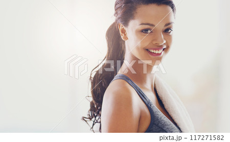 Healthy starts at home. Cropped portrait of an attractive young woman during her workout at home. 117271582