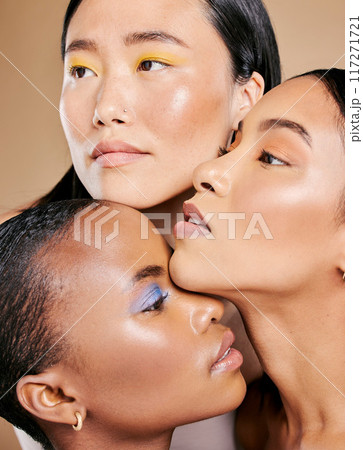 Beauty, diversity and face of women with makeup for creativity isolated on studio background. Skincare, cosmetology and model friends with facial cosmetics foundation in different shades on backdrop 117271721