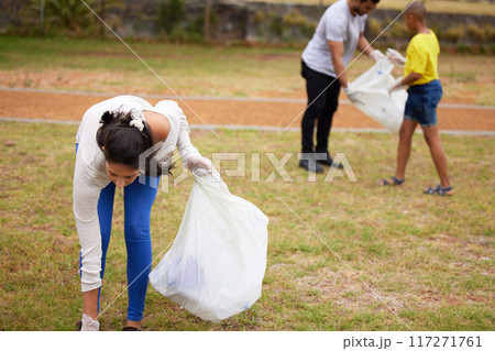 Community volunteer, garbage and people cleaning trash, pollution or waste product for environment support. Plastic recycling, NGO charity and eco friendly person helping with nature park clean up 117271761