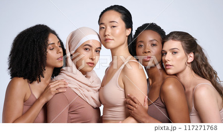 Beauty, diversity and women in portrait with skin, inclusion and different, global and community with support and equality in race. Skincare, wellness and natural cosmetics against studio background. Beauty, diversity and women in portrait with skin, inclusion and different, global and community with support and equality in race. Skincare, wellness and natural cosmetics against studio background. 117271768