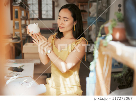 Woman, pottery product and designer in workshop, creative studio and manufacturing startup. Female small business owner, ceramic talent and artist working with sculpture, creativity and craft process Woman, pottery product and designer in workshop, creative studio and manufacturing startup. Female small business owner, ceramic talent and artist working with sculpture, creativity and craft process 117272067