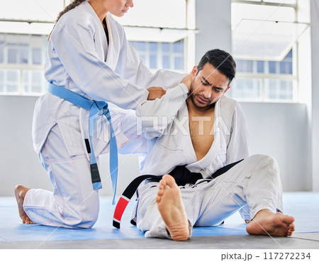 Karate, neck pain and man with an injury in sports training, exercise or body workout hurt in an accident. Problem, emergency and injured martial arts expert or athlete with muscle pain or bruise Karate, neck pain and man with an injury in sports training, exercise or body workout hurt in an accident. Problem, emergency and injured martial arts expert or athlete with muscle pain or bruise 117272234